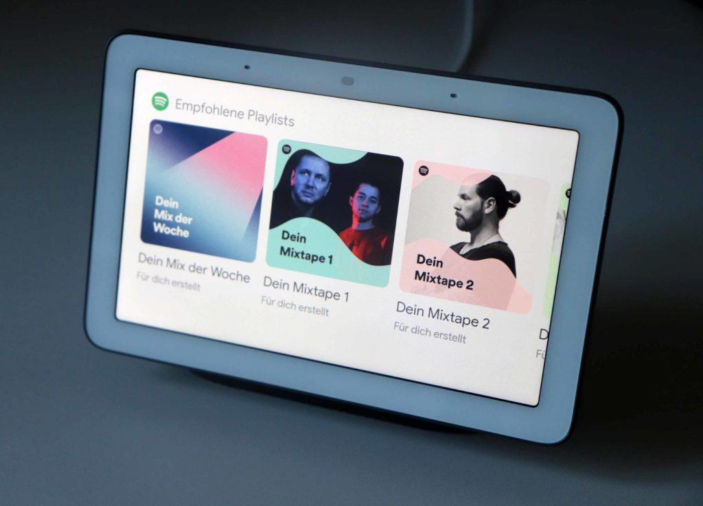 Google Nest Hub playing a breakfast playlist while pancakes are served