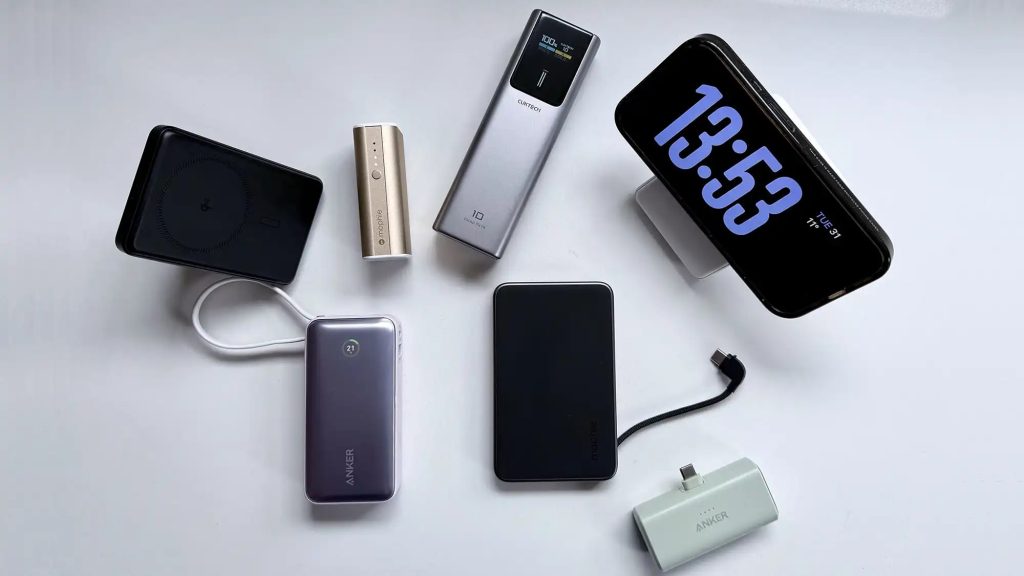 Modern portable power bank charging smartphone and smartwatch together.