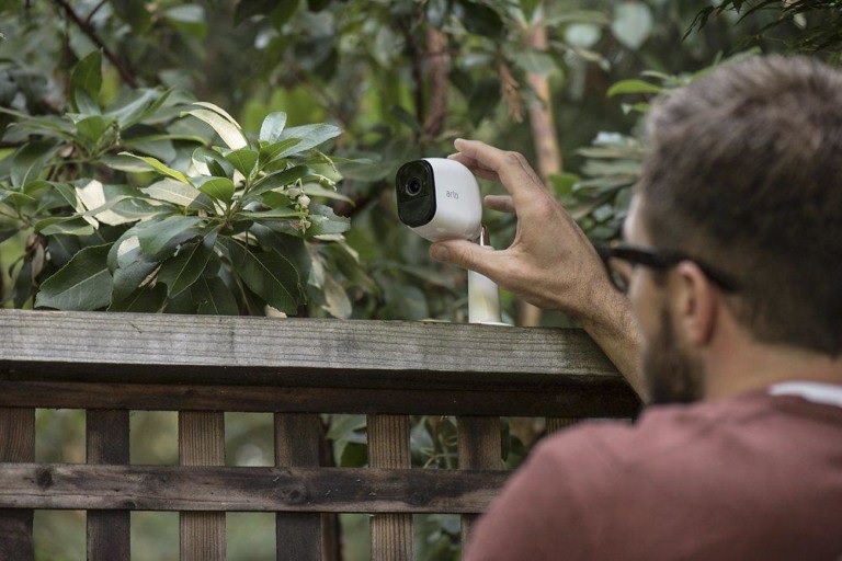 Wireless outdoor DIY home security camera installed on a house