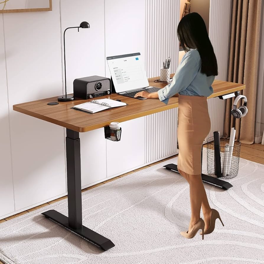 Electric standing desk setup in a modern home office 2025