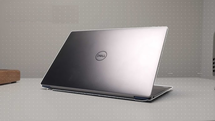 Pro 2025 aluminum design compared with Dell XPS 13 Plus carbon fiber build.