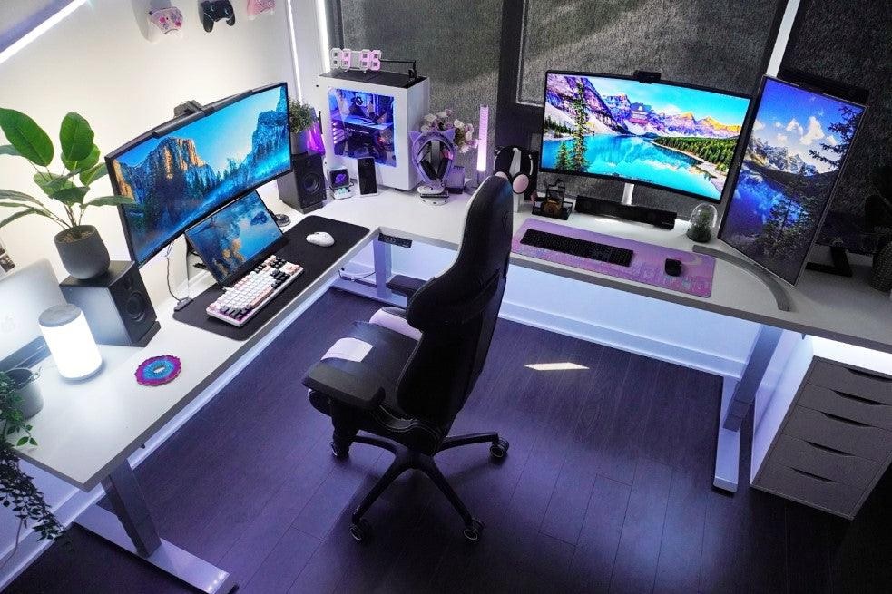 gaming home office setup with ergonomic chair and clean desk lighting